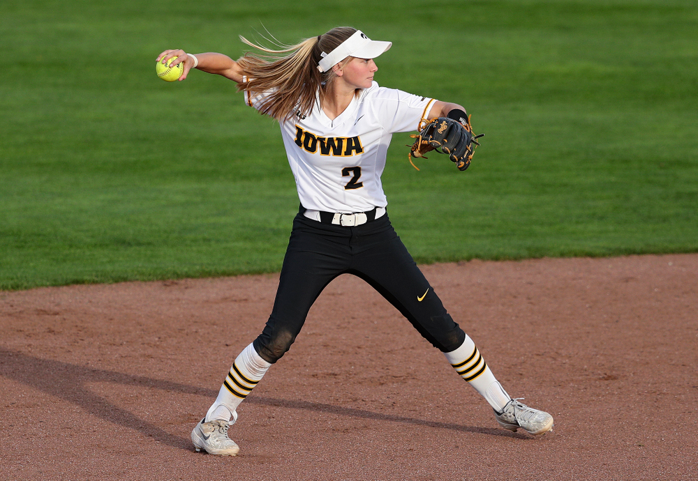 Iowa second baseman Aralee Bogar (2) throws to first for an out during the fifth inning of their game against Ohio State at Pearl Field in Iowa City on Friday, May. 3, 2019. (Stephen Mally/hawkeyesports.com)