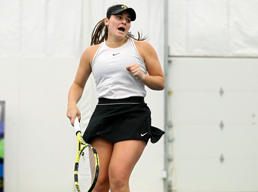 Iowa’s Danielle Bauers celebrates a point during her doubles match at the Hawkeye Tennis and Recreation Complex in Iowa City on Sunday, February 16, 2020. (Stephen Mally/hawkeyesports.com)