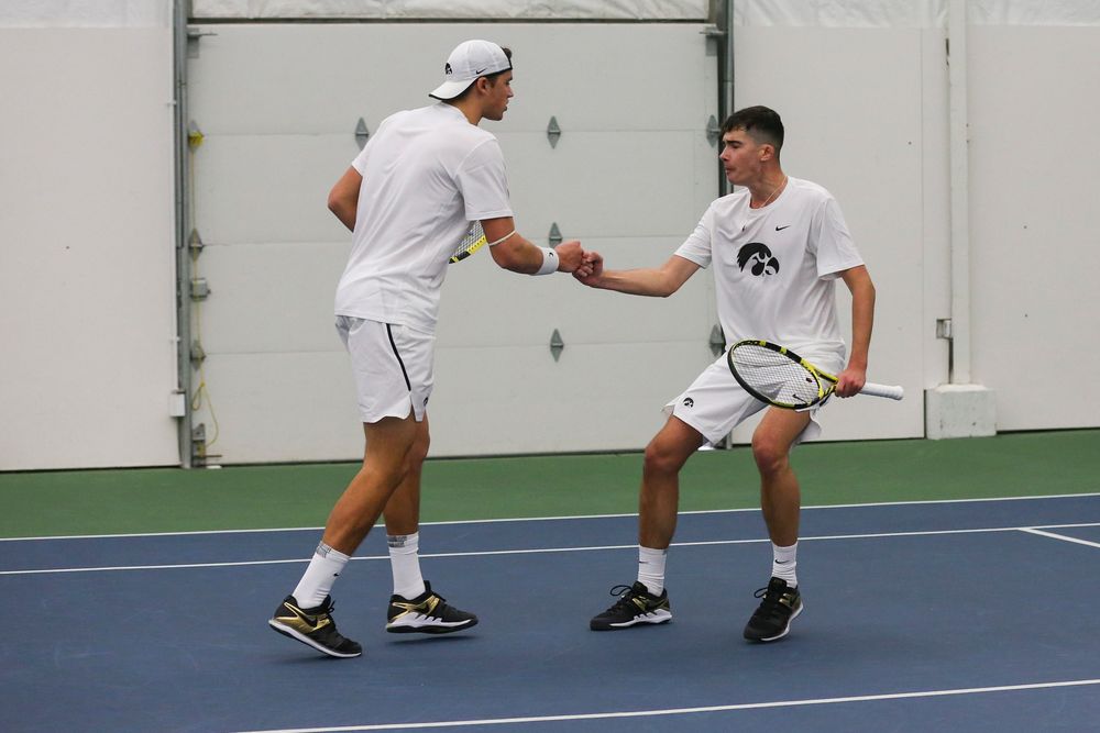 Iowa’s Joe Tyler and Matt Clegg celebrate a point during the Iowa men’s tennis match vs Western Michigan on Saturday, January 18, 2020 at the Hawkeye Tennis and Recreation Complex. (Lily Smith/hawkeyesports.com)
