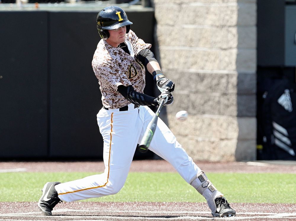 Iowa Hawkeyes second baseman Brendan Sher (2) drives a pitch for a hit during the second inning of their game against UC Irvine at Duane Banks Field in Iowa City on Sunday, May. 5, 2019. (Stephen Mally/hawkeyesports.com)