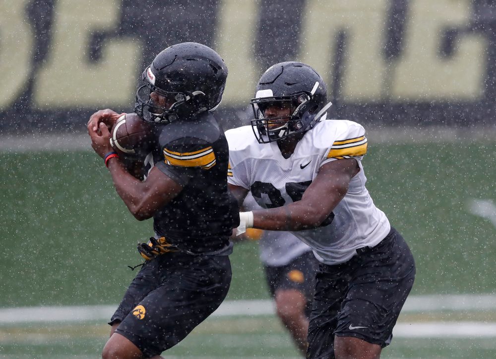 Iowa Hawkeyes wide receiver Tyrone Tracy Jr. (3) and linebacker Barrington Wade (35) during camp practice No. 15 Monday, August 20, 2018 at the Hansen Football Performance Center. (Brian Ray/hawkeyesports.com)