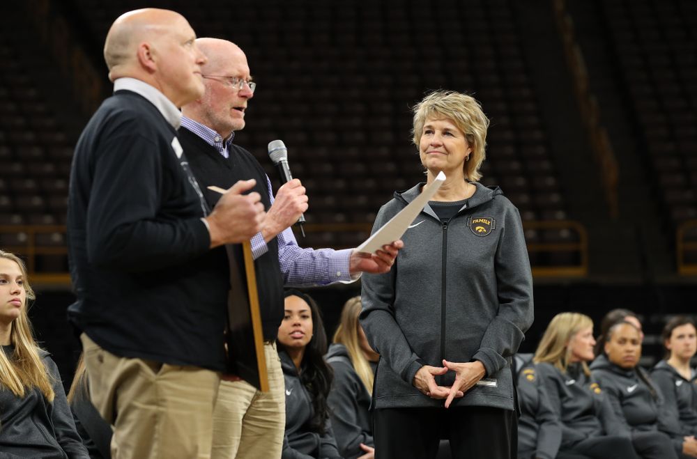 Iowa City Mayor Jim Throgmorton and Coralville Mayor John Lundell present Iowa Hawkeyes head coach Lisa Bluder with a joint proclamation designating April 24, 2019 as Iowa WomenÕs Basketball Day during the teamÕs Celebr-Eight event Wednesday, April 24, 2019 at Carver-Hawkeye Arena. (Brian Ray/hawkeyesports.com)