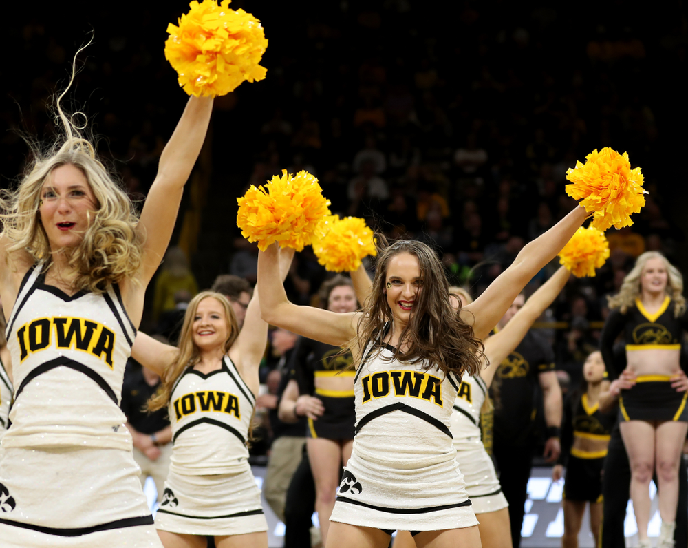 The Iowa Cheerleaders and Dance Team perform on senior night at half-time of the Iowa Hawkeyes game against the Purdue Boilermakers Tuesday, March 3, 2020 at Carver-Hawkeye Arena. (Brian Ray/hawkeyesports.com)