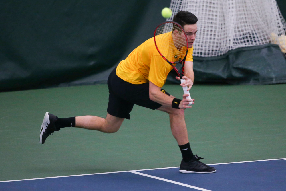Iowa's Jonas Larsen at a tennis match vs Drake Friday, March 8, 2019 at the Hawkeye Tennis and Recreation Complex. (Lily Smith/hawkeyesports.com)