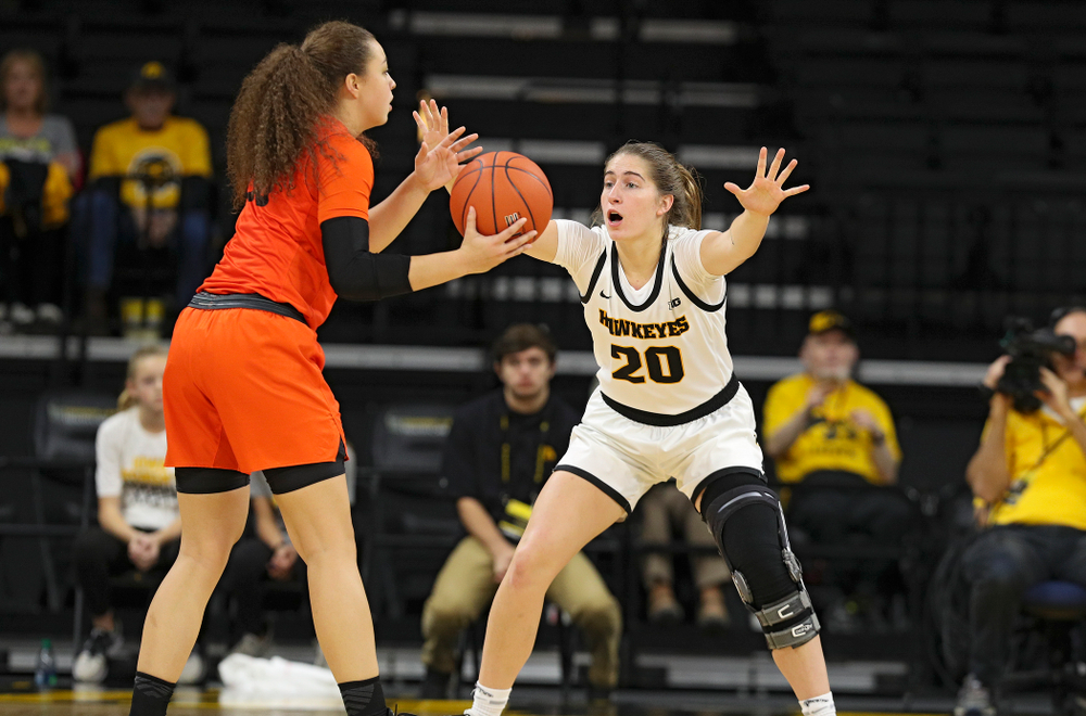 Iowa guard Kate Martin (20) defends during the second quarter of their overtime win against Princeton at Carver-Hawkeye Arena in Iowa City on Wednesday, Nov 20, 2019. (Stephen Mally/hawkeyesports.com)