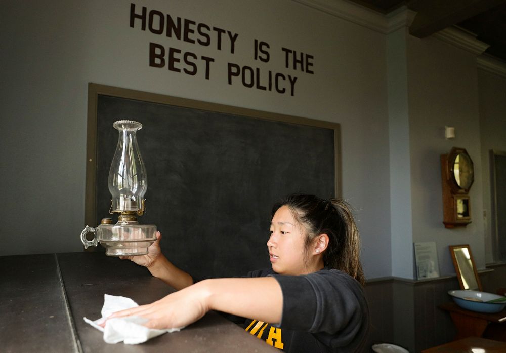 Iowa women's gymnasts clean the 1876 Coralville Schoolhouse during the 21st annual ISAAC Hawkeye Day of Caring in Coralville on Sunday, Apr. 28, 2019. (Stephen Mally/hawkeyesports.com)