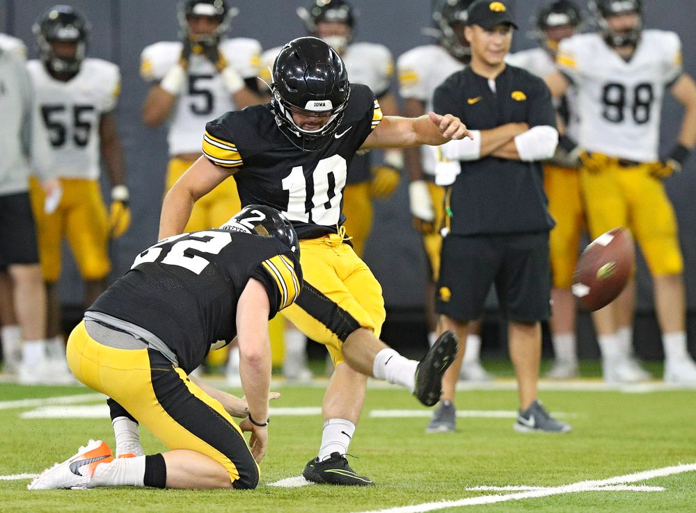 Iowa Hawkeyes place kicker Caleb Shudak (10) kicks from the hold of Michael Sleep-Dalton (22) during Fall Camp Practice No. 6 at the Hansen Football Performance Center in Iowa City on Thursday, Aug 8, 2019. (Stephen Mally/hawkeyesports.com)