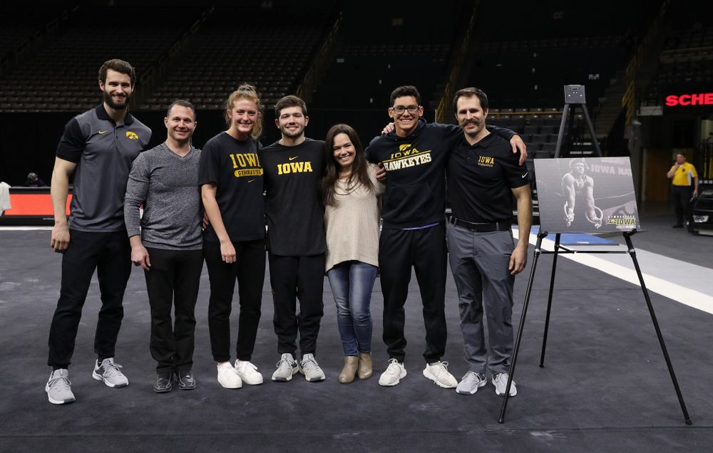 Iowa Men's Gymnast Rogelio Vazquez and his family during senior day ceremonies following their meet against the Ohio State Buckeyes Saturday, March 16, 2019 at Carver-Hawkeye Arena. (Brian Ray/hawkeyesports.com)