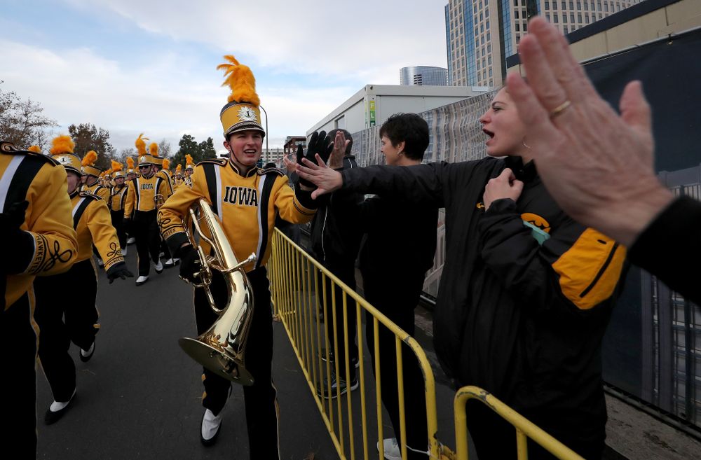 The Hawkeye Marching Band and the Iowa Spirit Squad march in the Holiday Bowl Parade Thursday, December 26, 2019 in San Diego. (Brian Ray/hawkeyesports.com)