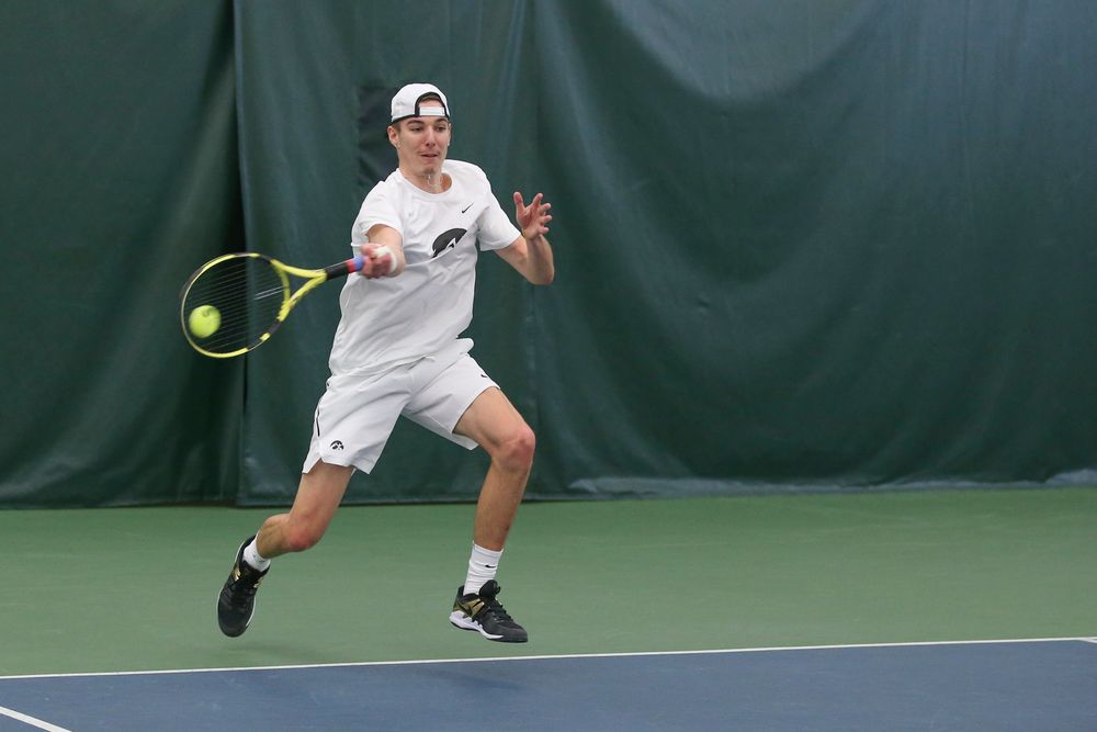 Iowa’s Nikita Snezhko during the Iowa men’s tennis meet vs Nebraska on Sunday, March 1, 2020 at the Hawkeye Tennis and Recreation Complex. (Lily Smith/hawkeyesports.com)