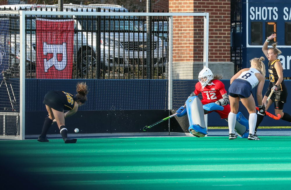Iowa Hawkeyes forward Maddy Murphy (26) scores the game winning goal in their 1-0 overtime victory over Penn State to win the 2019 Big Ten Field Hockey Tournament Sunday, November 10, 2019 at Penn State (Brian Ray/hawkeyesports.com)