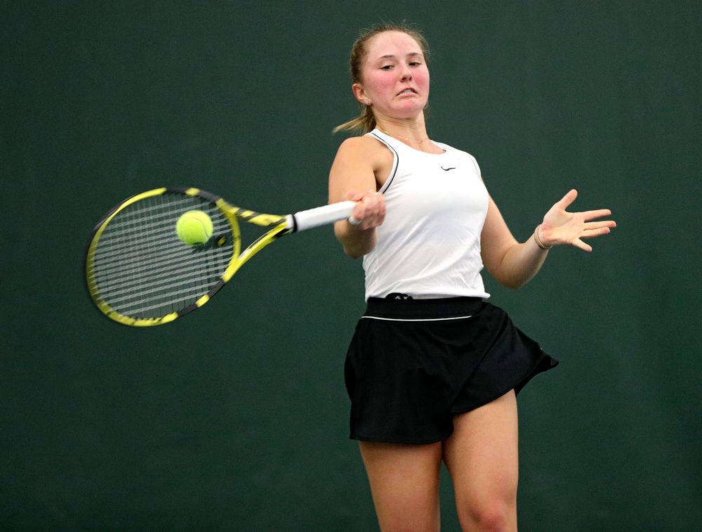 Iowa’s Danielle Burich returns a shot during her singles match at the Hawkeye Tennis and Recreation Complex in Iowa City on Sunday, February 16, 2020. (Stephen Mally/hawkeyesports.com)