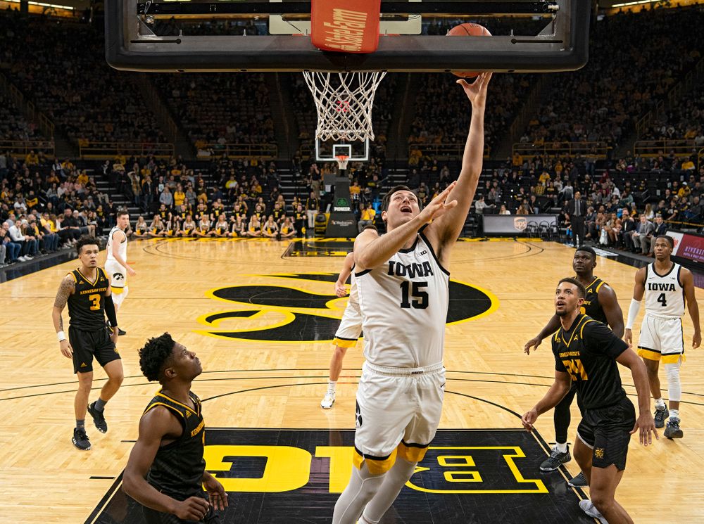 Iowa Hawkeyes forward Ryan Kriener (15) scores inside during the second half of their their game at Carver-Hawkeye Arena in Iowa City on Sunday, December 29, 2019. (Stephen Mally/hawkeyesports.com)