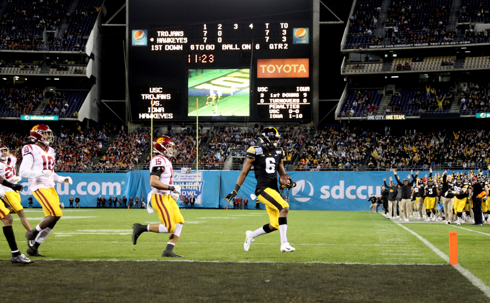 Iowa Hawkeyes wide receiver Ihmir Smith-Marsette (6) scores a touchdown against USC in the Holiday Bowl Friday, December 27, 2019 at San Diego Community Credit Union Stadium. (Brian Ray/hawkeyesports.com)