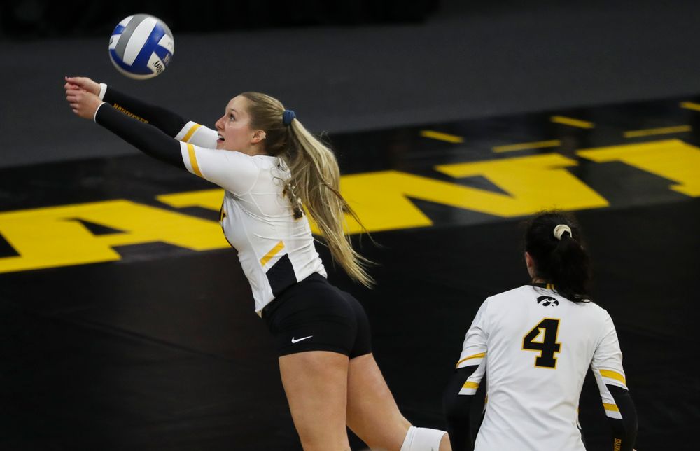 Iowa Hawkeyes defensive specialist Maddie Slagle (15) bumps the ball during a match against Rutgers at Carver-Hawkeye Arena on November 2, 2018. (Tork Mason/hawkeyesports.com)