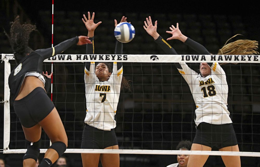 Iowa’s Brie Orr (7) and Hannah Clayton (18) try for a block during the third set of their Big Ten/Pac-12 Challenge match against Colorado at Carver-Hawkeye Arena in Iowa City on Friday, Sep 6, 2019. (Stephen Mally/hawkeyesports.com)