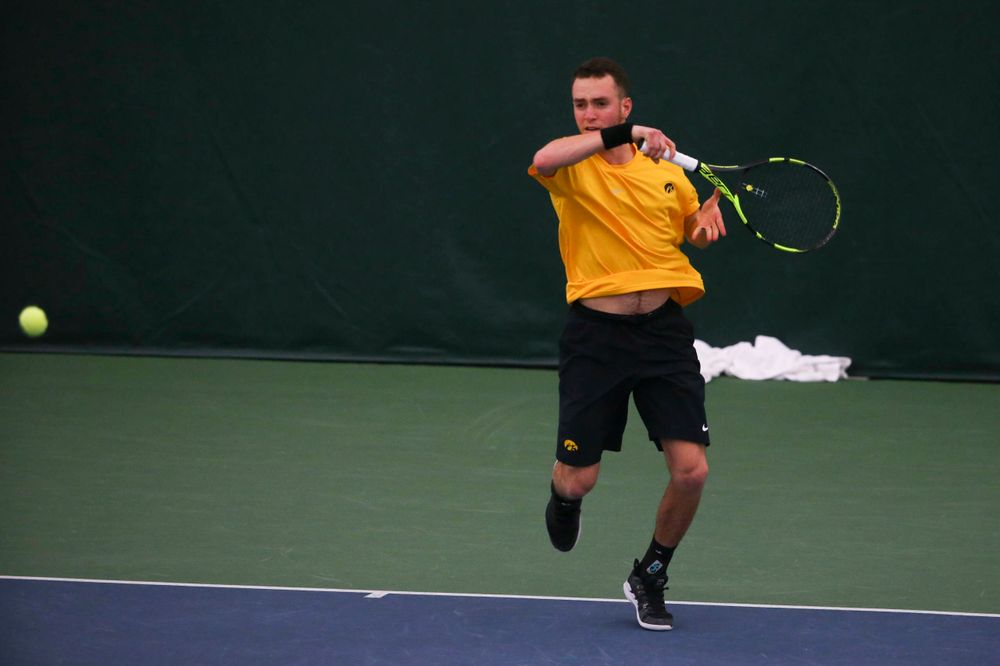 Iowa's Kareem Allaf at a tennis match vs Drake Friday, March 8, 2019 at the Hawkeye Tennis and Recreation Complex. (Lily Smith/hawkeyesports.com)