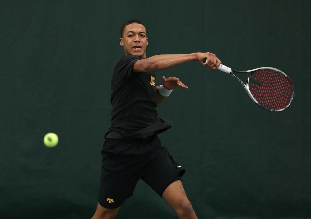 Iowa's Oliver Okonkwo against UMKC Friday, February 15, 2019 at the Hawkeye Tennis and Recreation Complex. (Brian Ray/hawkeyesports.com)
