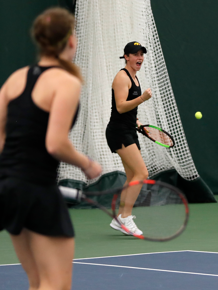Elise Van Heuvelen and Anastasia Reimchen play a doubles match against Ohio State Sunday, March 25, 2018 at the Hawkeye Tennis and Recreation Center. (Brian Ray/hawkeyesports.com)