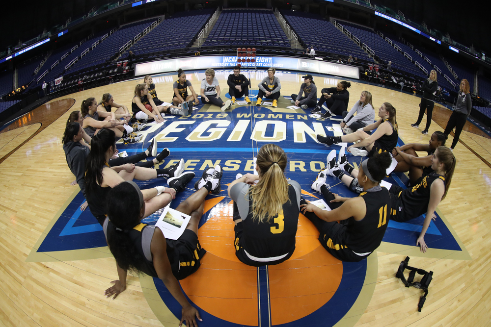 The Iowa Hawkeyes talk in their circle during shoot around before their regional final against the Baylor Lady Bears in the 2019 NCAA Women's College Basketball Tournament Monday, April 1, 2019 at Greensboro Coliseum in Greensboro, NC.(Brian Ray/hawkeyesports.com)