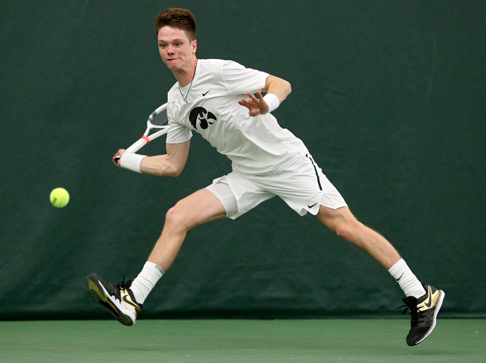 Iowa’s Jason Kerst returns a shot during his singles match at the Hawkeye Tennis and Recreation Complex in Iowa City on Sunday, February 16, 2020. (Stephen Mally/hawkeyesports.com)