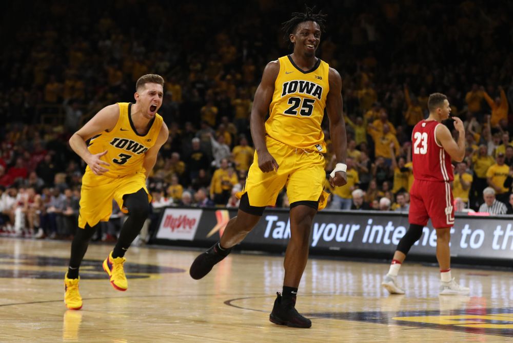 Iowa Hawkeyes guard Jordan Bohannon (3) and forward Tyler Cook (25) against the Wisconsin Badgers Friday, November 30, 2018 at Carver-Hawkeye Arena. (Brian Ray/hawkeyesports.com)