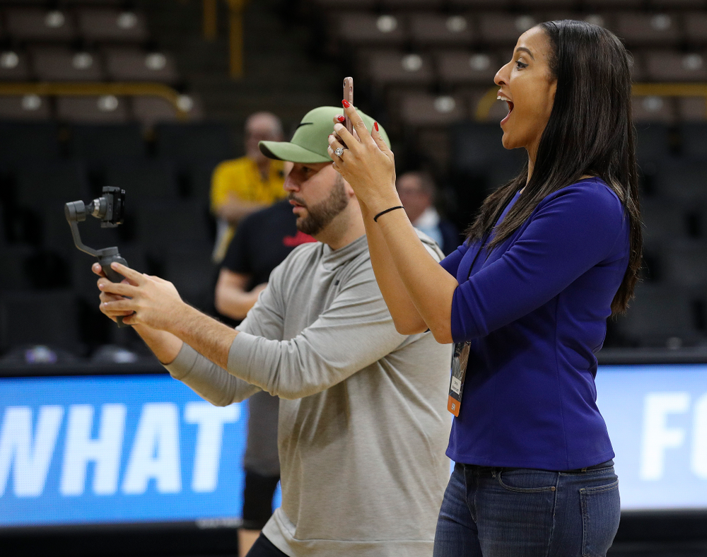 Christy Winters Scott, analyst for ESPN, watches in amazement as Iowa Hawkeyes forward Megan Gustafson (not picture) runs a drill at a practice during the 2019 NCAA Women's Basketball Tournament at Carver Hawkeye Arena in Iowa City on Saturday, Mar. 23, 2019. (Stephen Mally for hawkeyesports.com)