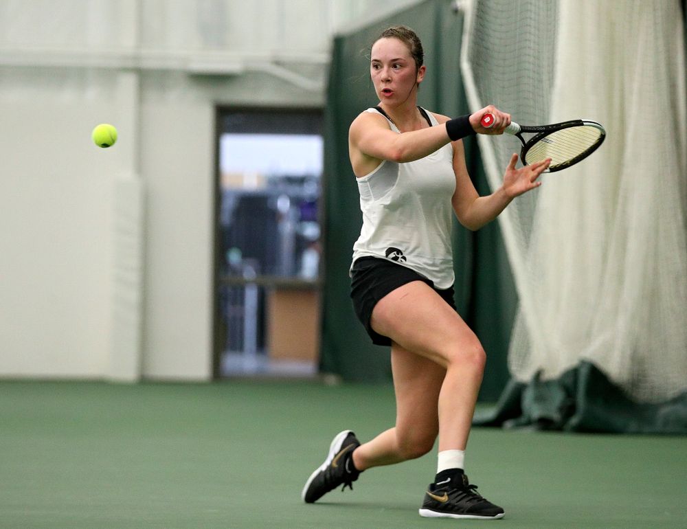 Iowa’s Samantha Mannix returns a shot during her singles match at the Hawkeye Tennis and Recreation Complex in Iowa City on Sunday, February 23, 2020. (Stephen Mally/hawkeyesports.com)