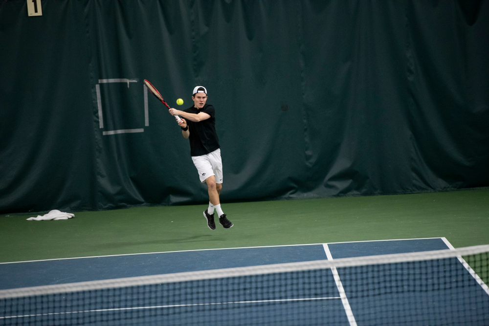 The Iowa men's tennis team competes against Cornell in The Rise Tennis Center in Ithaca, NY on Sunday, Feb. 24, 2019.