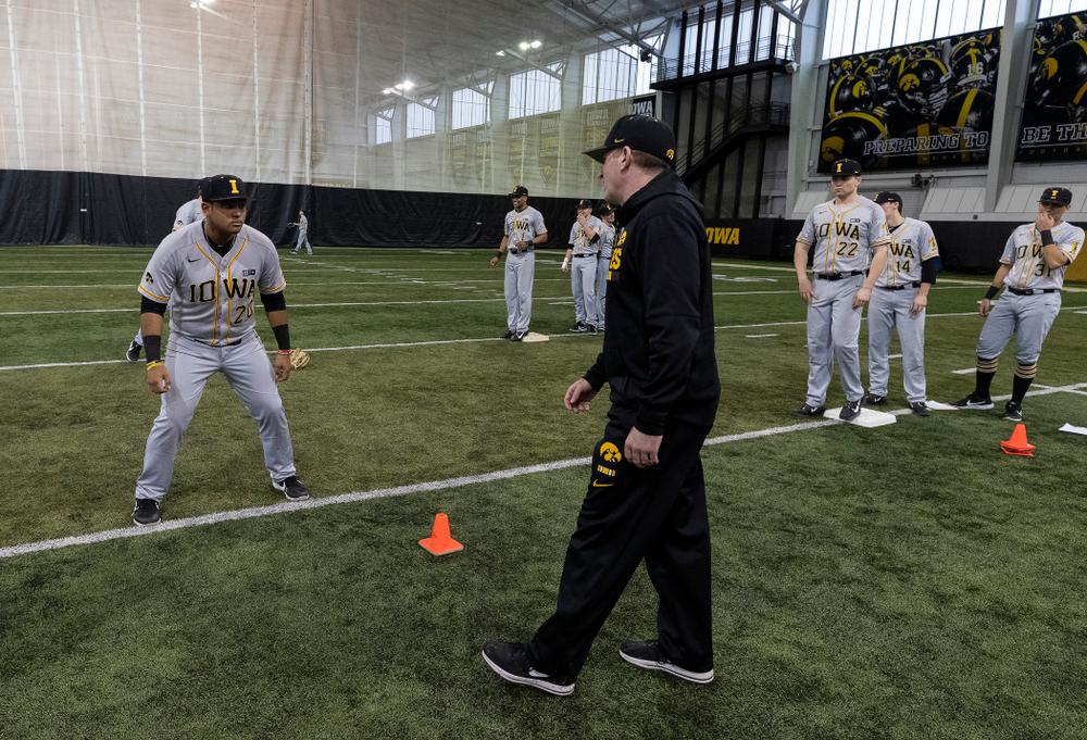 Iowa Hawkeyes associate head coach Marty Sutherland works on base running following the team's annual media day Tuesday, February 5, 2019 in the Indoor Practice Facility. (Brian Ray/hawkeyesports.com)
