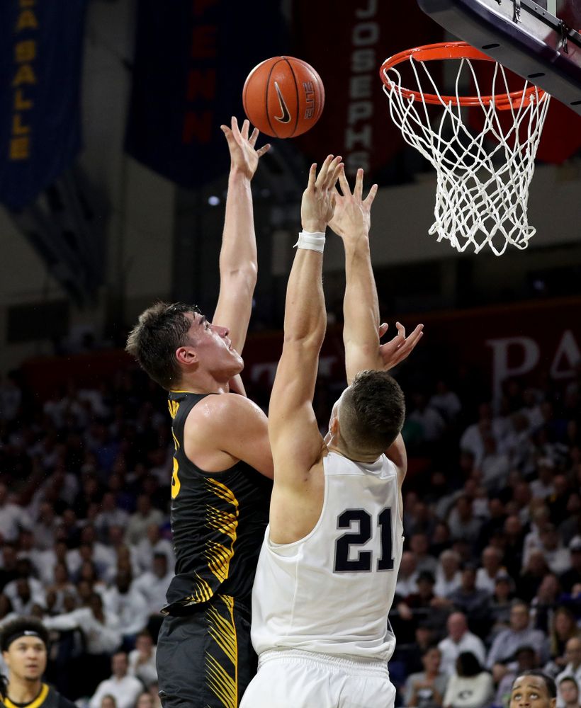 Iowa Hawkeyes forward Luka Garza (55) against Penn State Saturday, January 4, 2020 at the Palestra in Philadelphia. (Brian Ray/hawkeyesports.com)