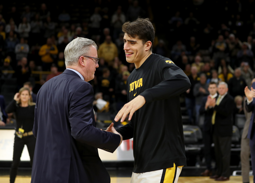 Iowa Hawkeyes forward Luka Garza (55) and head coach Fran McCaffery against the Minnesota Golden Gophers Monday, December 9, 2019 at Carver-Hawkeye Arena. (Brian Ray/hawkeyesports.com)