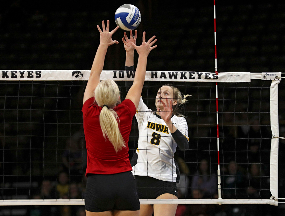 Iowa’s Kyndra Hansen (8) tips the ball over the net during the first set of their match against Nebraska at Carver-Hawkeye Arena in Iowa City on Saturday, Nov 9, 2019. (Stephen Mally/hawkeyesports.com)