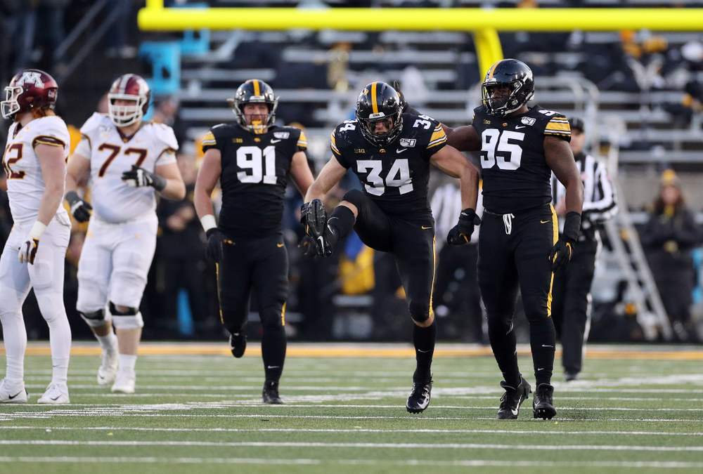 Iowa Hawkeyes linebacker Kristian Welch (34) gets a sack against the Minnesota Golden Gophers Saturday, November 16, 2019 at Kinnick Stadium. (Brian Ray/hawkeyesports.com)