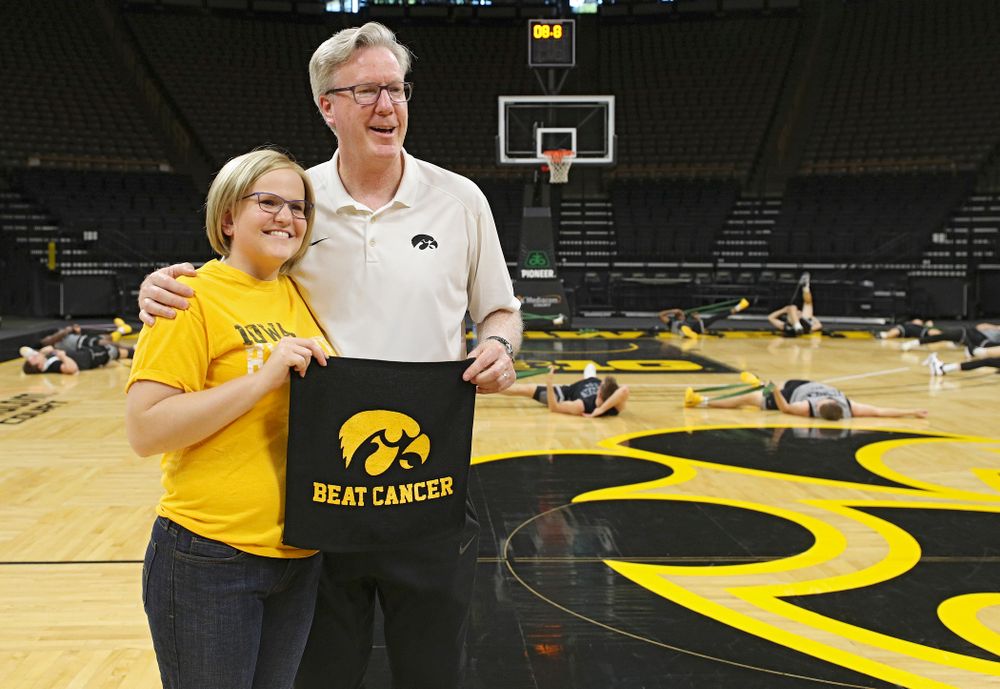Iowa Hawkeyes head coach Fran McCaffery takes pictures with visitors from the University of Iowa Hospitals and Clinics Adolescent and Young Adult (AYA) Cancer Program after practice at Carver-Hawkeye Arena in Iowa City on Monday, Sep 30, 2019. (Stephen Mally/hawkeyesports.com)
