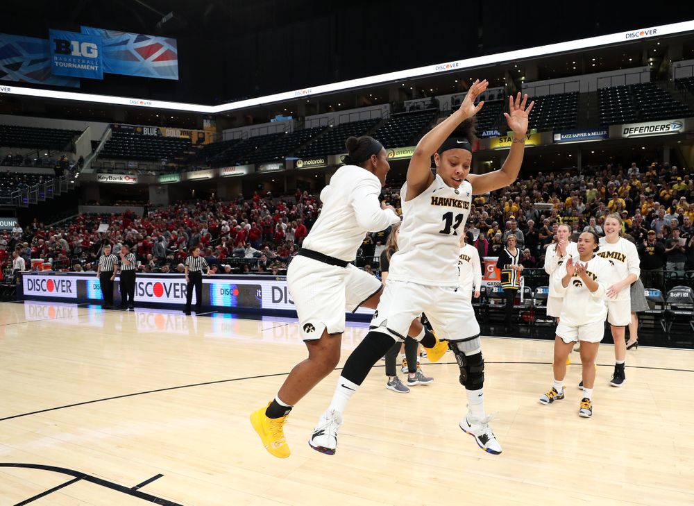 Iowa Hawkeyes guard Tania Davis (11) and guard Zion Sanders (24) against the Indiana Hoosiers in the quarterfinals of the Big Ten Tournament Friday, March 8, 2019 at Bankers Life Fieldhouse in Indianapolis, Ind. (Brian Ray/hawkeyesports.com)