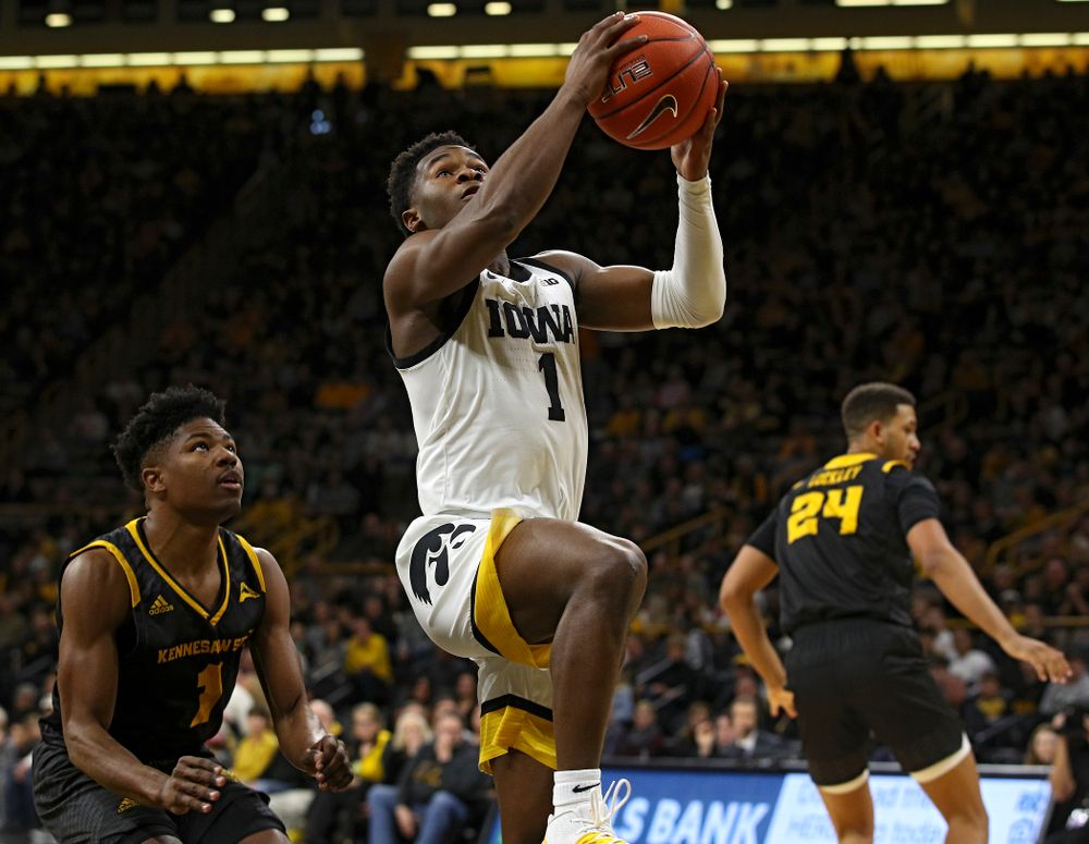 Iowa Hawkeyes guard Joe Toussaint (1) scores a basket during the first half of their their game at Carver-Hawkeye Arena in Iowa City on Sunday, December 29, 2019. (Stephen Mally/hawkeyesports.com)