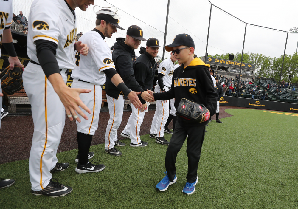 Garret Nichols throws out a first pitch before the Iowa Hawkeyes game against Michigan State Sunday, May 12, 2019 at Duane Banks Field. (Brian Ray/hawkeyesports.com)