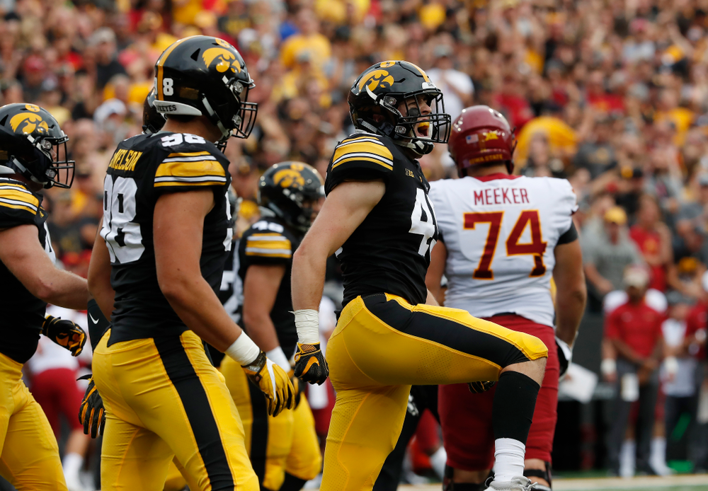 Iowa Hawkeyes linebacker Nick Niemann (49) celebrates after sacking Iowa State Cyclones quarterback Kyle Kempt (17) Saturday, September 8, 2018 at Kinnick Stadium. (Brian Ray/hawkeyesports.com)