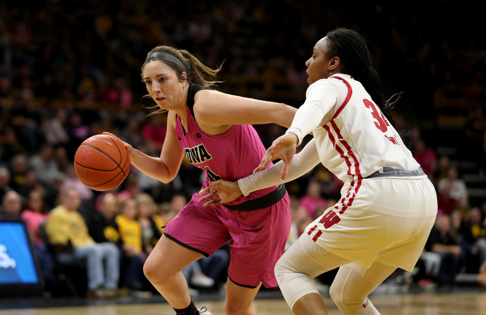 Iowa Hawkeyes forward McKenna Warnock (14) against the Wisconsin Badgers Sunday, February 16, 2020 at Carver-Hawkeye Arena. (Brian Ray/hawkeyesports.com)