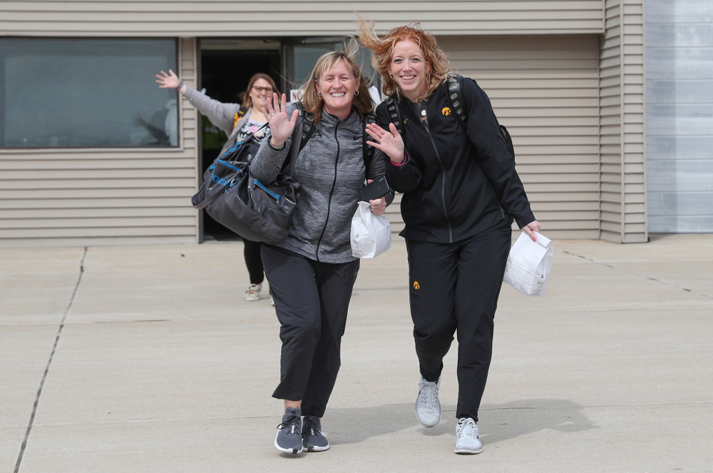 Associate head coach Jenni Fitzgerald and trainer Jennie Sertterh board the team plane to Greensboro, NC for the Regionals of the 2019 NCAA Women's Basketball Championships Thursday, March 28, 2019 at the Eastern Iowa Airport. (Brian Ray/hawkeyesports.com)