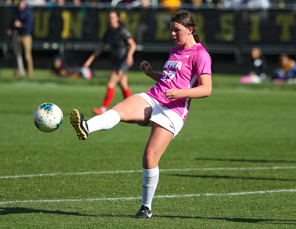 Iowa forward Samantha Tawharu (27) passes the ball during the first half of their match at the Iowa Soccer Complex in Iowa City on Sunday, Oct 27, 2019. (Stephen Mally/hawkeyesports.com)