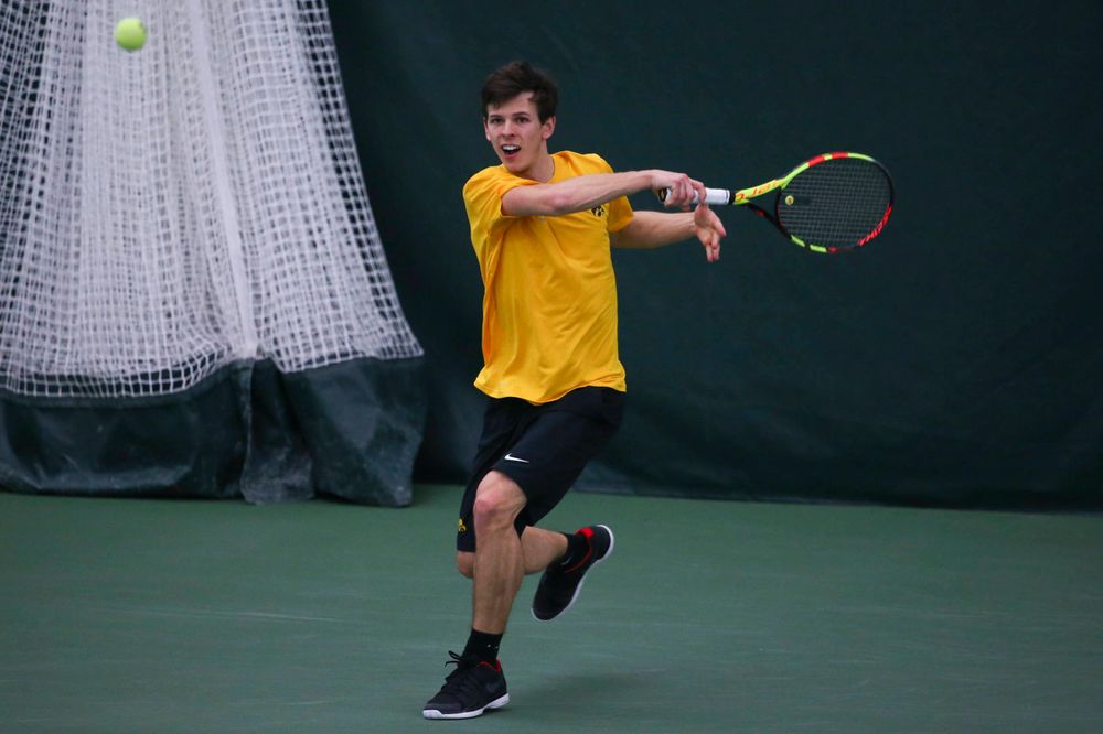 Iowa's Joe Tyler at a tennis match vs Drake Friday, March 8, 2019 at the Hawkeye Tennis and Recreation Complex. (Lily Smith/hawkeyesports.com)