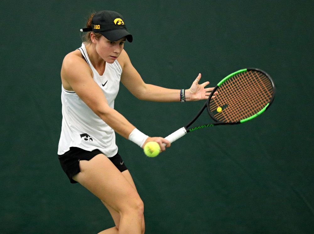 Iowa’s Elise Van Heuvelen returns a shot during her singles match at the Hawkeye Tennis and Recreation Complex in Iowa City on Sunday, February 16, 2020. (Stephen Mally/hawkeyesports.com)