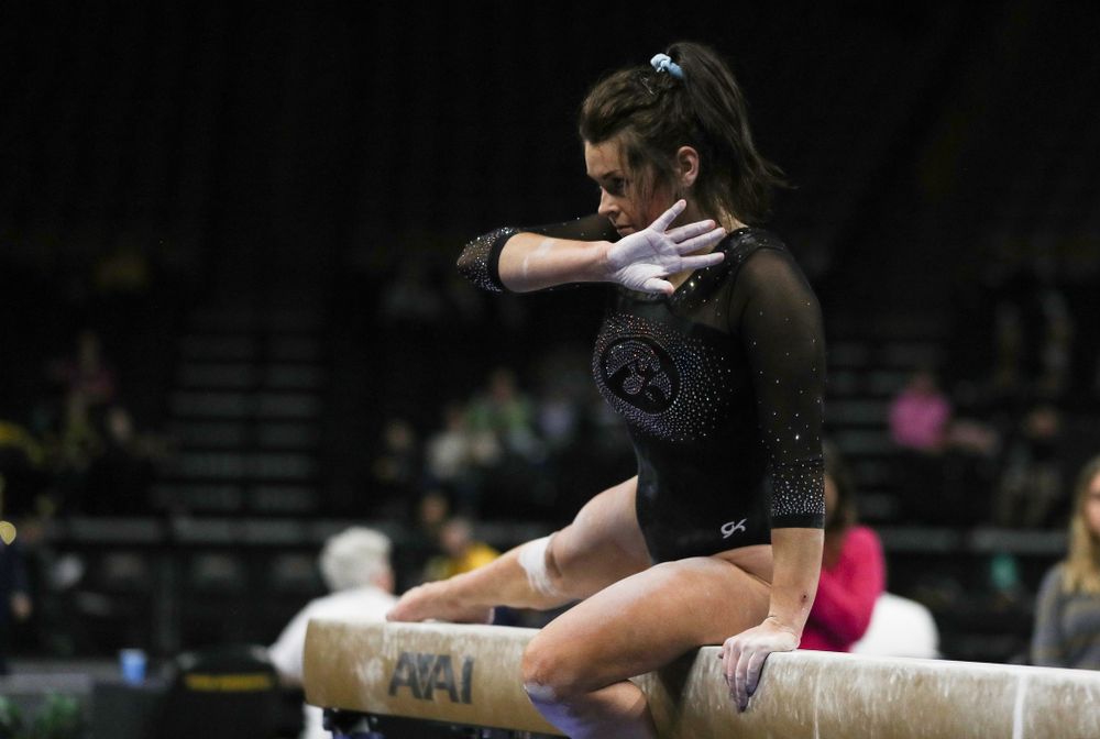 Iowa’s Erin Castle competes on the beam against Michigan Friday, February 14, 2020 at Carver-Hawkeye Arena. (Brian Ray/hawkeyesports.com)
