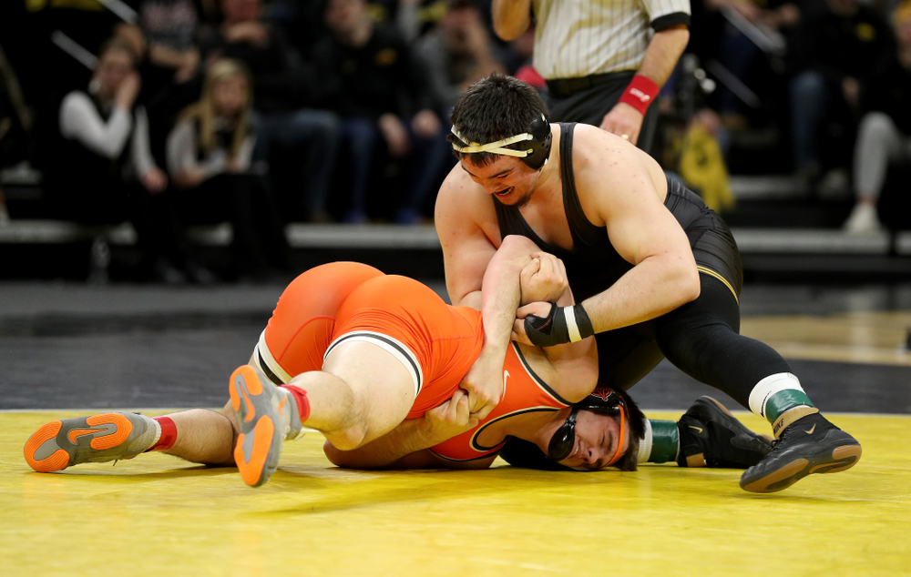Iowa’s Tony Cassioppi wrestles Oklahoma State’s Auston Harris at heavyweight Sunday, February 23, 2020 at Carver-Hawkeye Arena. Cassioppi won the match 11-1. (Brian Ray/hawkeyesports.com)