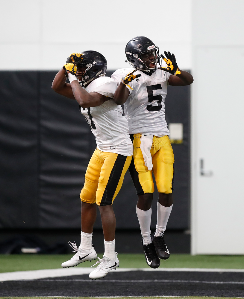 Iowa Hawkeyes defensive back Cedric Boswell (17) and defensive back Manny Rugamba (5) Wednesday, April 4, 2018 at the Hansen Football Performance Center. (Brian Ray/hawkeyesports.com)