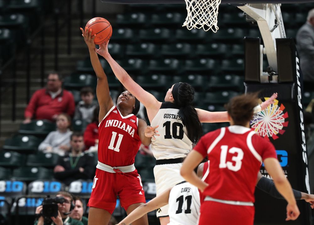Iowa Hawkeyes forward Megan Gustafson (10) blocks a shot against the Indiana Hoosiers in the quarterfinals of the Big Ten Tournament Friday, March 8, 2019 at Bankers Life Fieldhouse in Indianapolis, Ind. (Brian Ray/hawkeyesports.com)