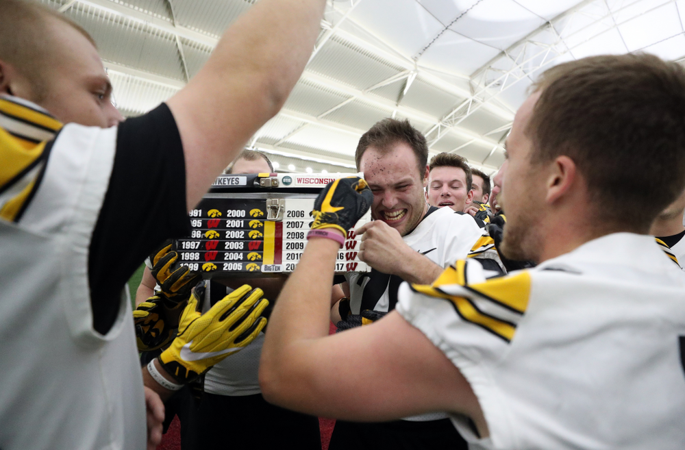The Hawkeye football managers capture the rusty toolbox for the first time since 2008 with a 20-19 double The Hawkeye Football Managers captured the rusty toolbox for the first time since 2008 with a 20-19 double overtime win against the Wisconsin football managers on Nov. 8 in Madison, Wisconsin. (Brian Ray/hawkeyesports.com)