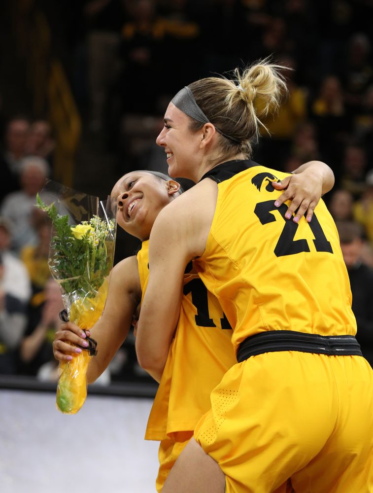 Iowa Hawkeyes guard Tania Davis (11) and forward Hannah Stewart (21) during senior day ceremonies following their game against the Northwestern Wildcats Sunday, March 3, 2019 at Carver-Hawkeye Arena. (Brian Ray/hawkeyesports.com)